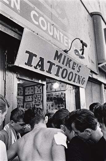 BRUCE DAVIDSON (1933- ) Mikes tattooing, from the series Brooklyn Gang.